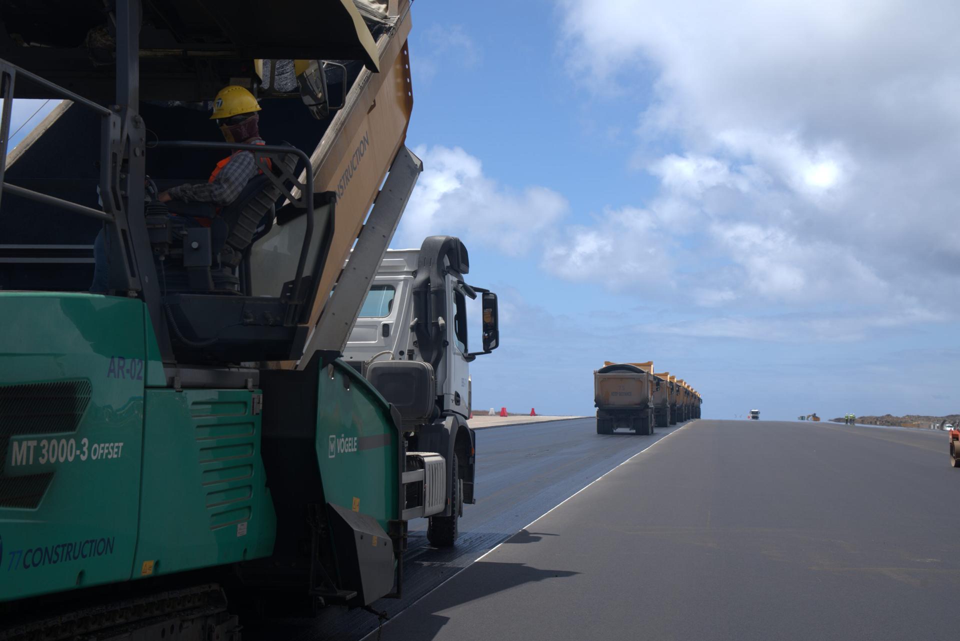Paving machine laying asphalt on a runway